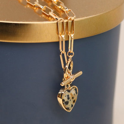 Golden dalmatian heart necklace with t-bar