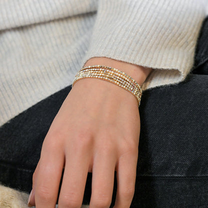 Golden multistrand cream mix crystal bracelet stack